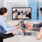 Businesspeople Looking At Computer Screen